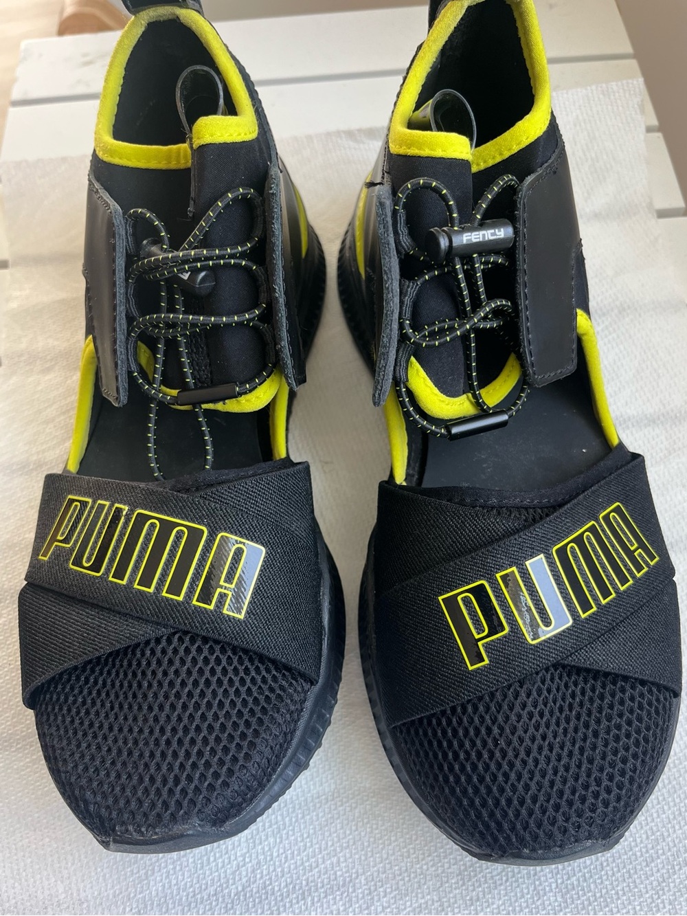 Puma women Black Sneakers with Neon Yellow Accents